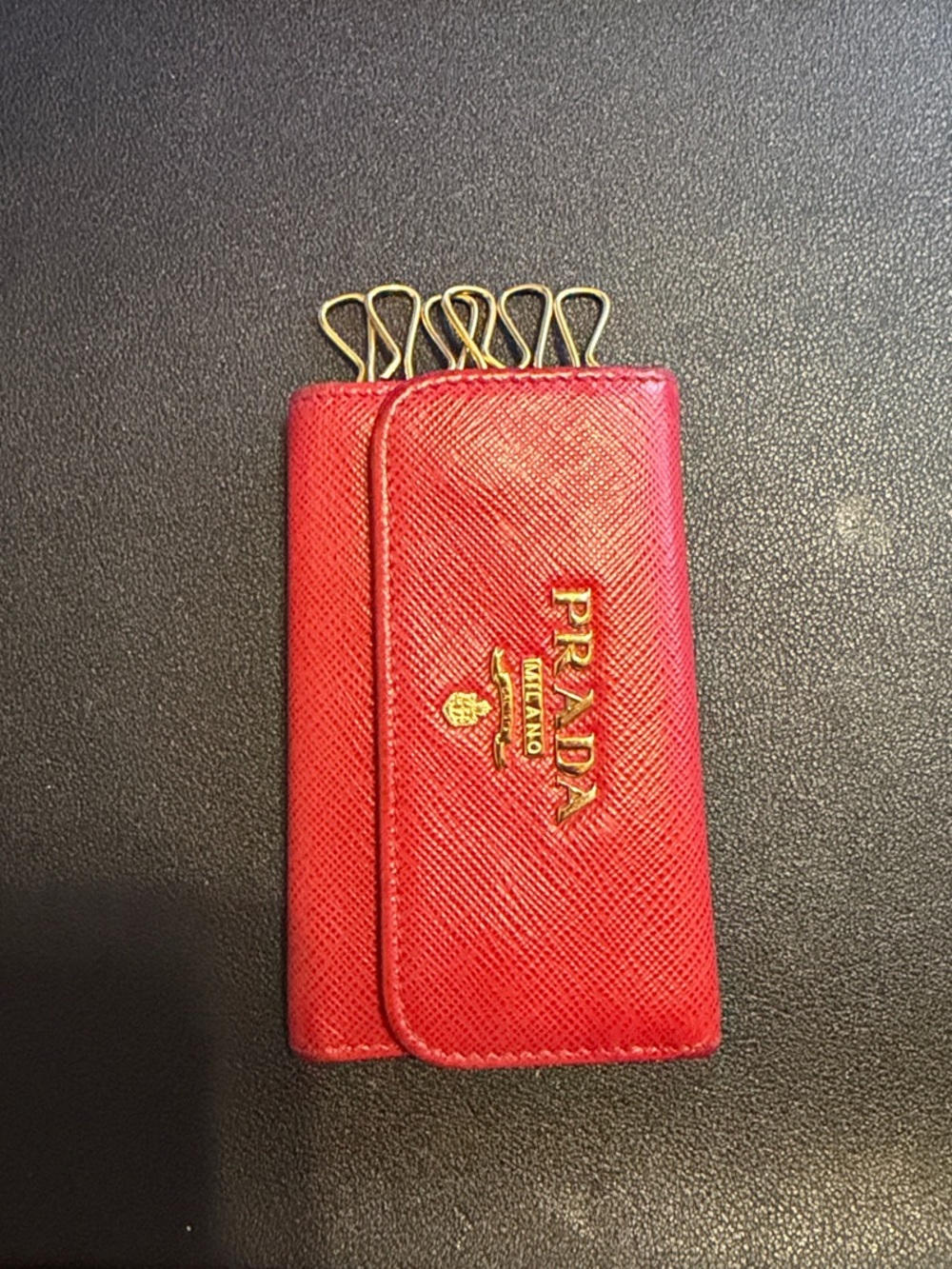 Authentic Prada Saffiano Leather 6 Key holder. Red with Gold Hardware